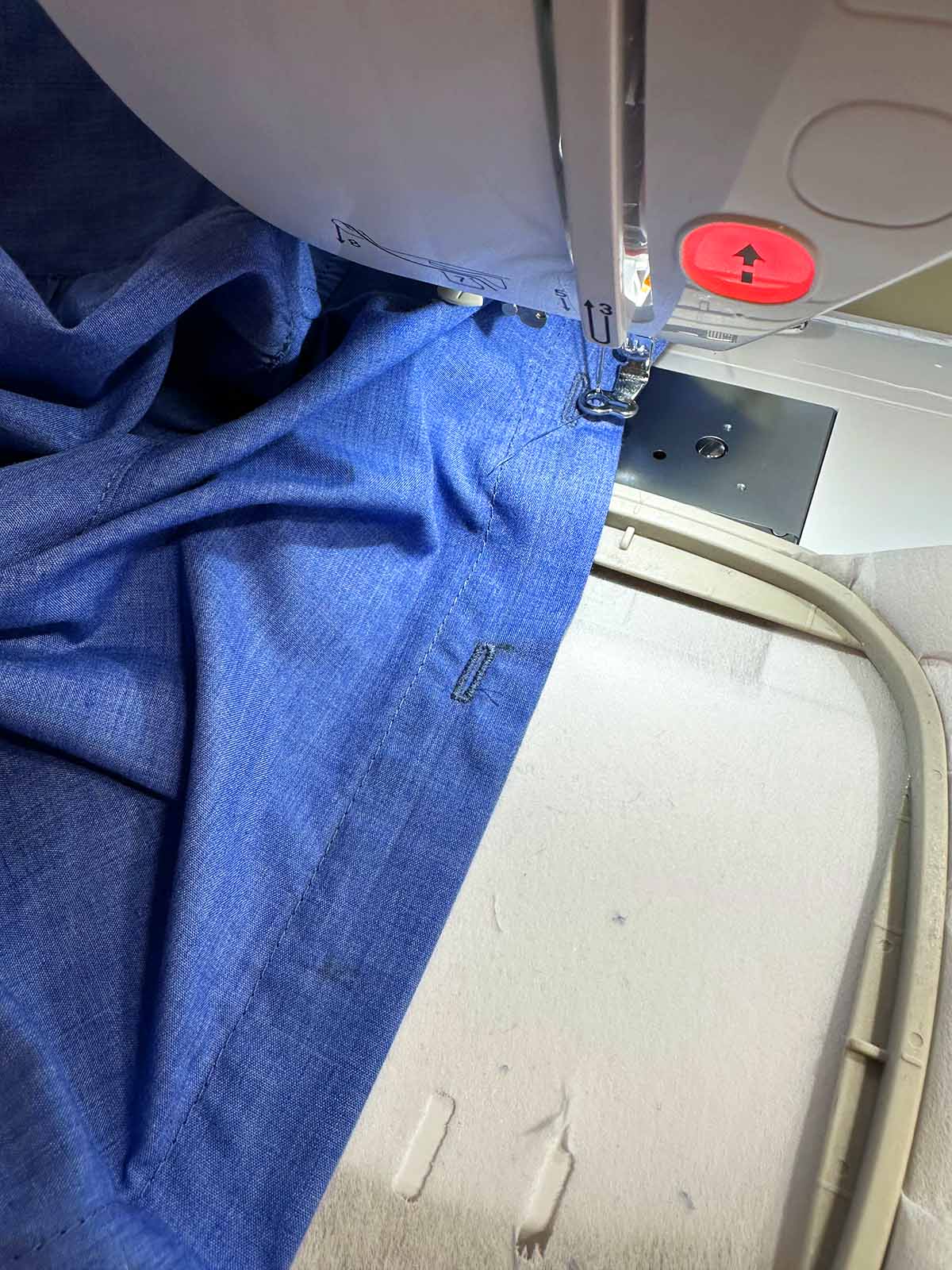buttonholes stitched with an embroidery machine during garment sewing
