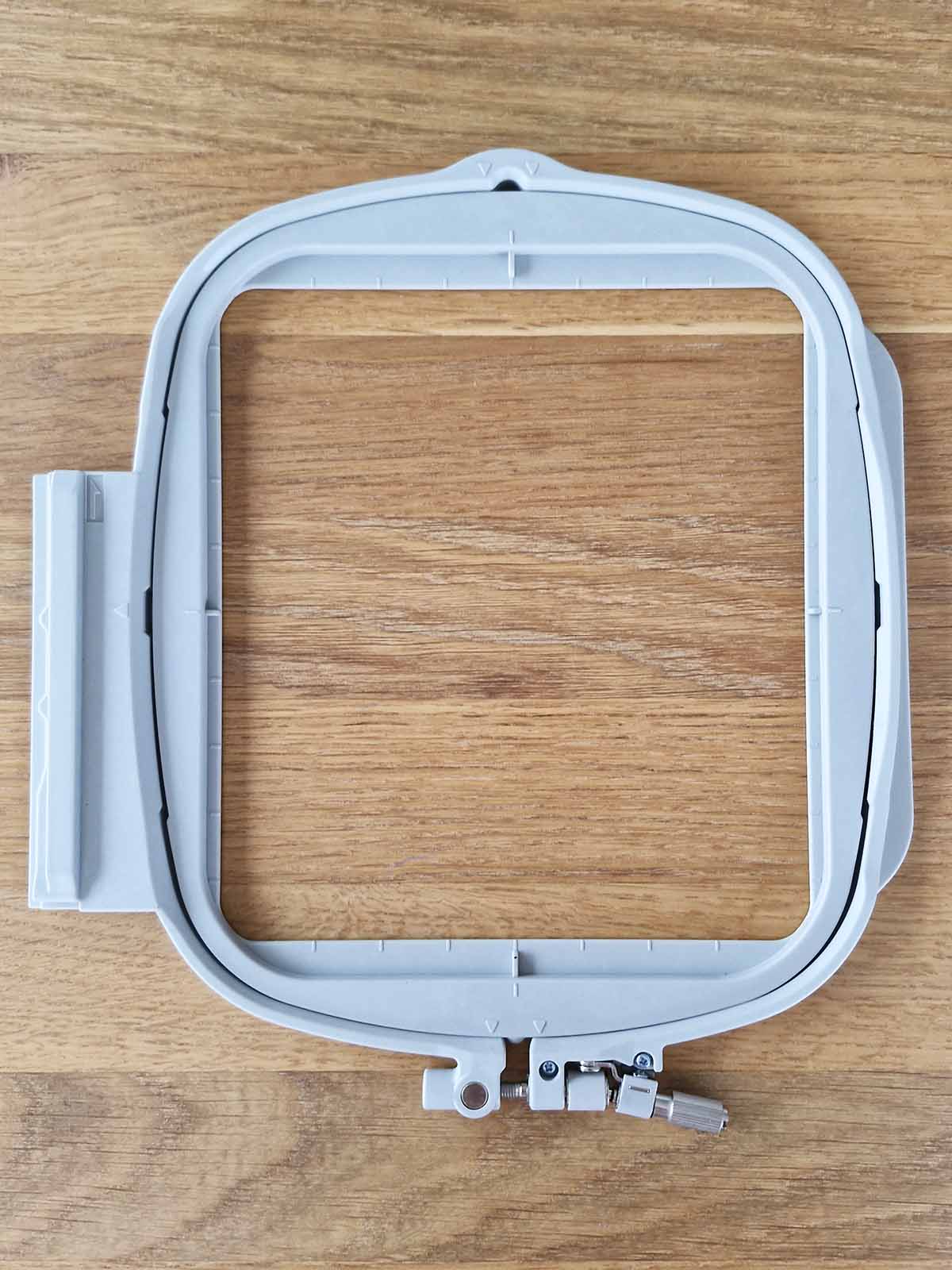 Brother embroidery hoop 160×180 usable area Brother 160x180 embroidery hoop showing the reduced usable embroidery area