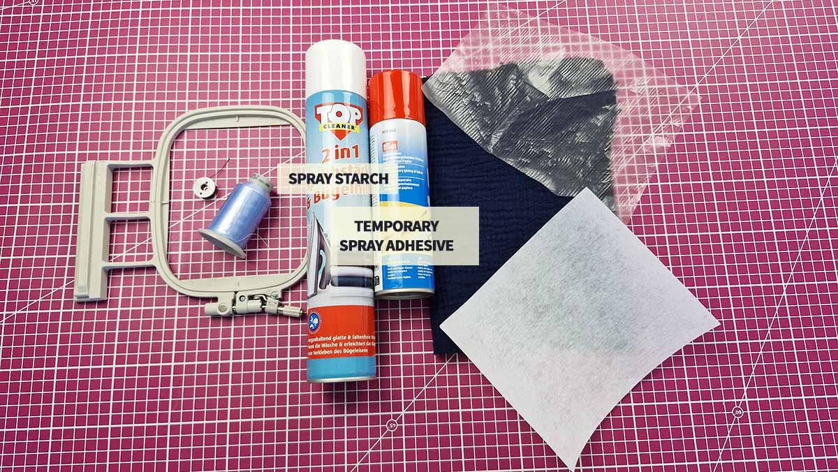 Materials for machine embroidery on muslin Materials used for machine embroidery on muslin including hoop, threads, muslin fabric, stabiliser, spray starch, adhesive and embroidery film