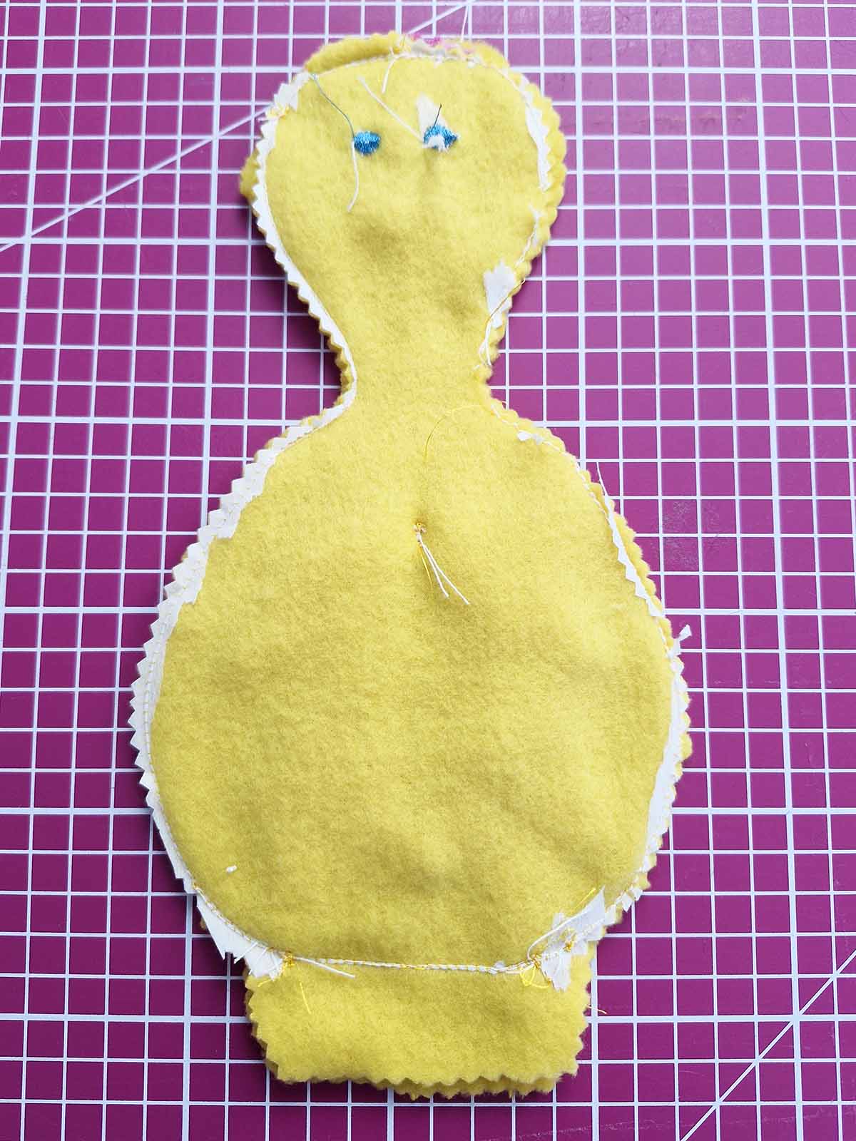 Trimmed duck body with excess stabilizer removed after cutting