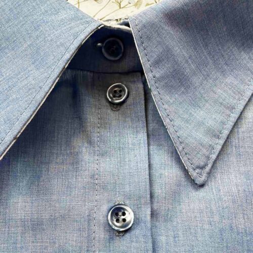 embroidered buttonhole on shirt with buttons closed