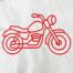 Motorcycle satin stitch embroidery design stitched in red on cotton fabric
