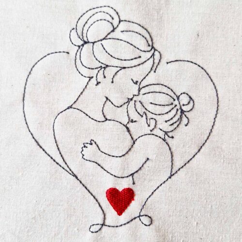 Mother and child line art embroidery design with heart detail stitched on cotton fabric